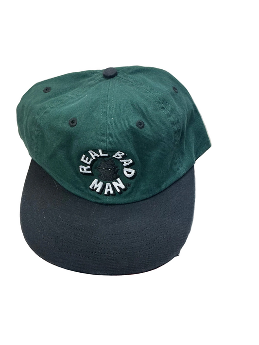 REAL BAD MAN CIRCULAR LOGO SNAPBACK HAT